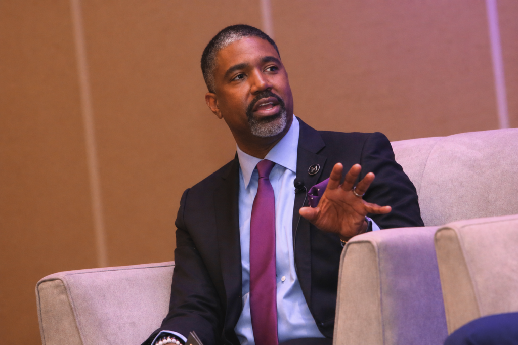Adrion Porter speaking at Black Enterprise XCEL Summit